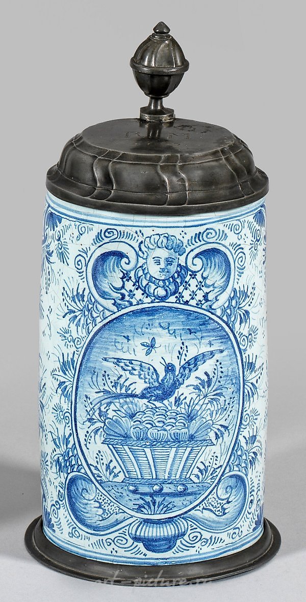 The term "Walzenkrug" in German refers to a specific type of ceramic vessel commonly used in traditional German drinking establishments. This exquisite piece of craftsmanship is characterized by its cylindrical shape and distinctive ribbed design. Th
