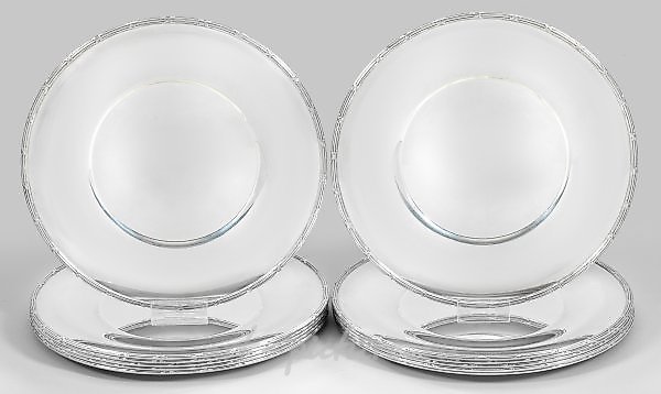 Sentence of twelve elegant place settings in the Empire style.
