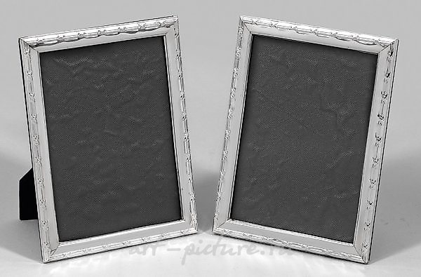 A pair of table picture frames.