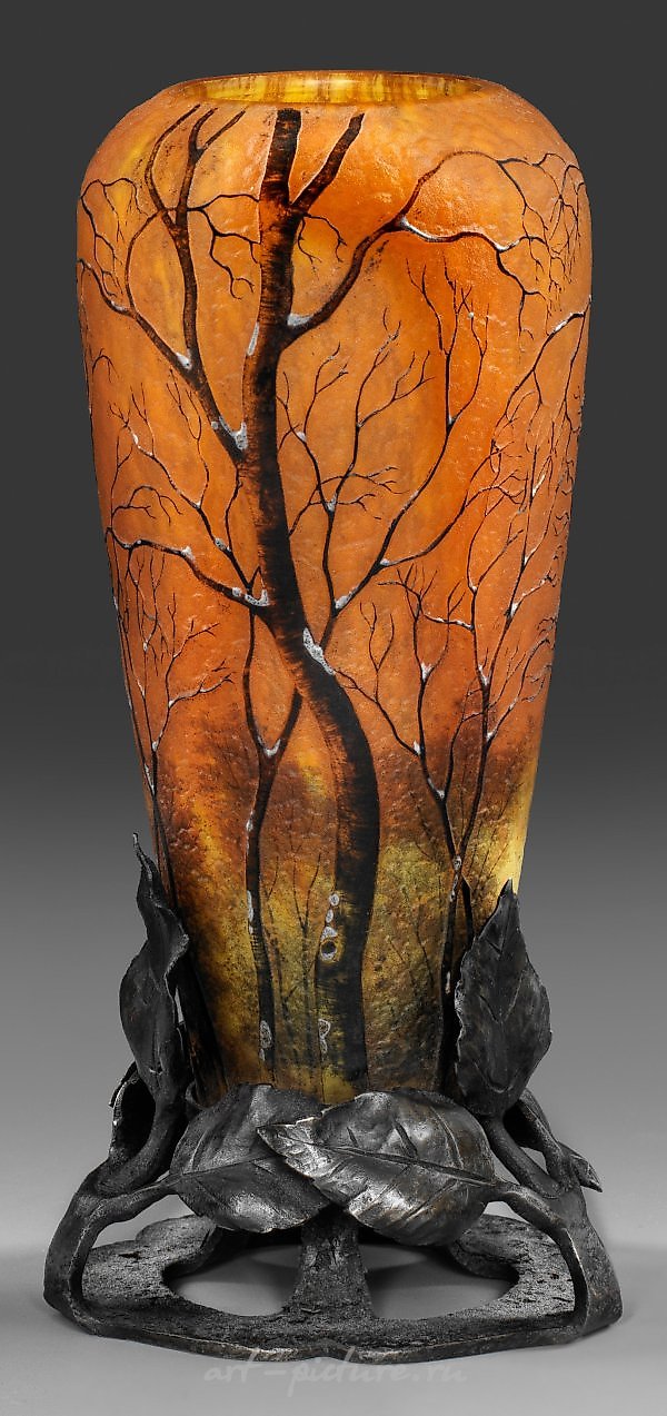 Daum Vase with Evening Winter Landscape "Paysage Hiver"

The exquisite Daum vase in question portrays a captivating evening winter landscape, aptly titled "Paysage Hiver." This masterpiece of glass artistry encapsulates the serene beauty and enchantm