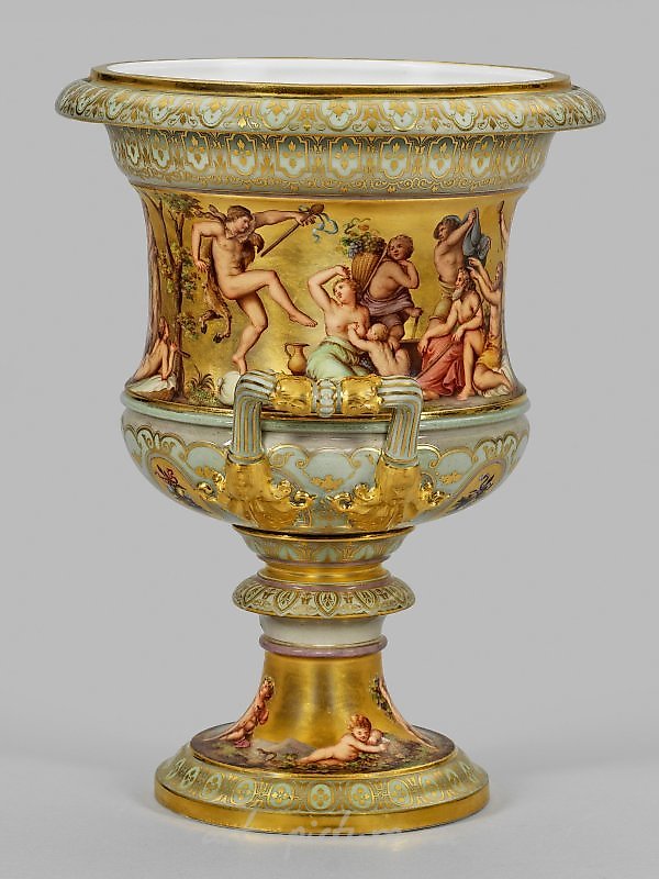 Opulent Meissen crater vase with Bacchanalian scenes.